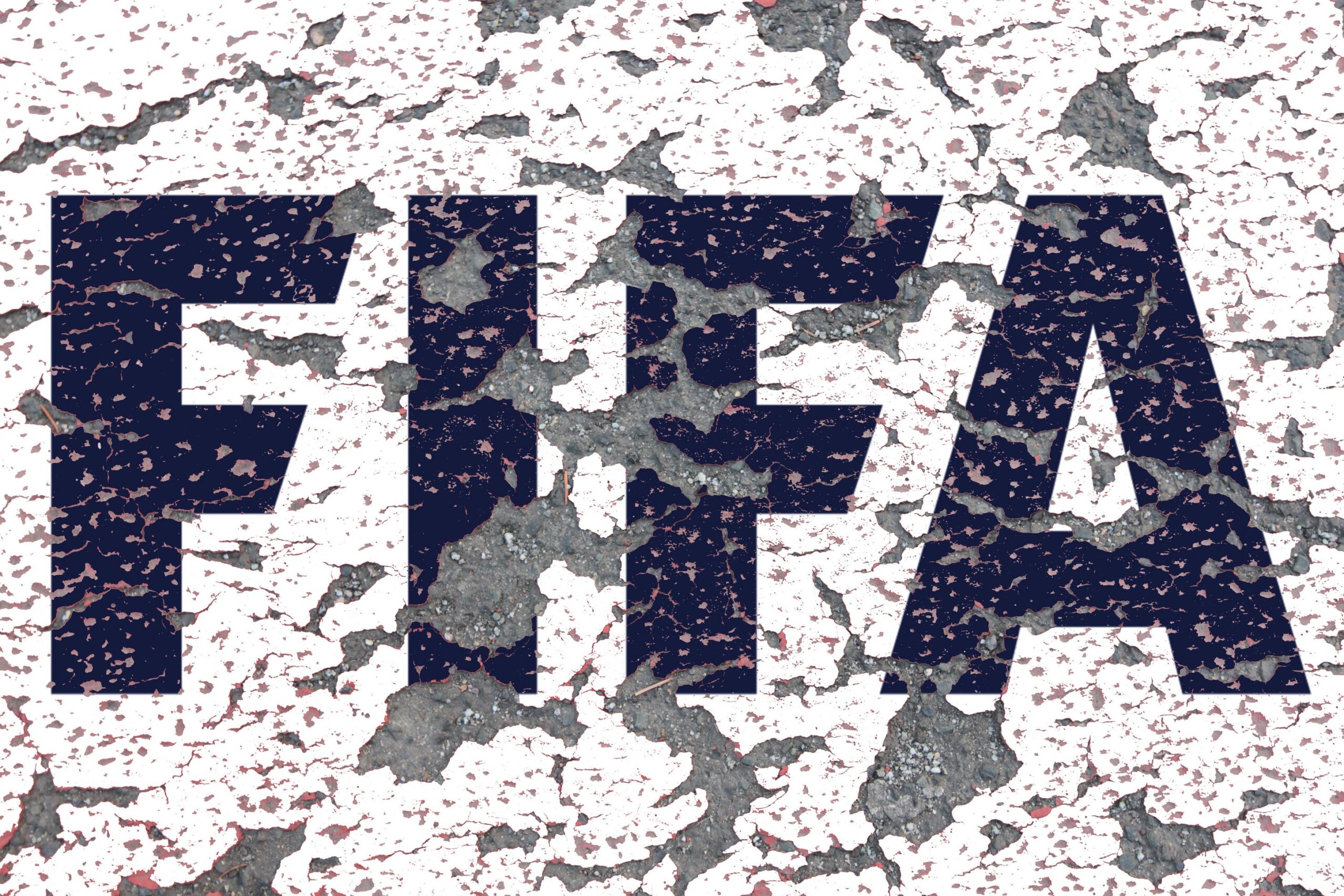 A photo of the FIFA logo on a wall where the paint is peeling off. Credit: CHROMORANGE / Ralph Peters / Alamy Stock Photo